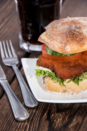 Fresh made Chicken Sandwich on wooden backgroundの写真素材