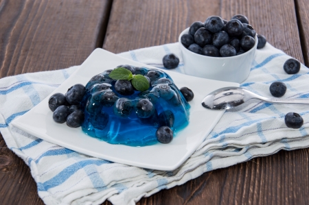 Portion of Blueberry jelly on wooden backgroundの写真素材