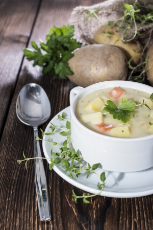Potatoe Cream Soup with fresh herbsの写真素材