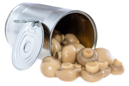 Mushrooms in a can isolated on white backgroundの写真素材