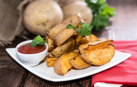 Portion of fresh made Potato Wedgesの写真素材