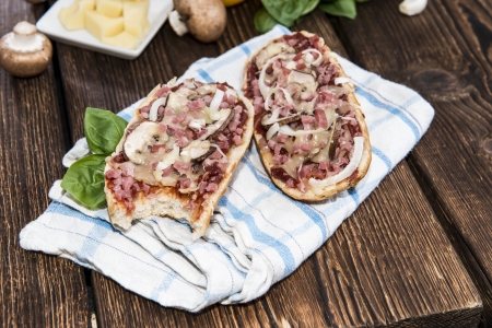 Ham Baguette with Mushrooms on wooden backgroundの写真素材