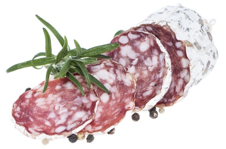 Portion of fresh Salami isolated on white background