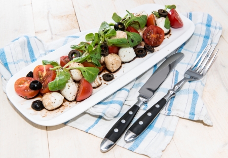 Portion of Salad with Balsamic Vinegar on a plateの写真素材