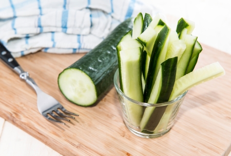 Fresh made Cucumber Sticks in a small glass (diet food)の写真素材