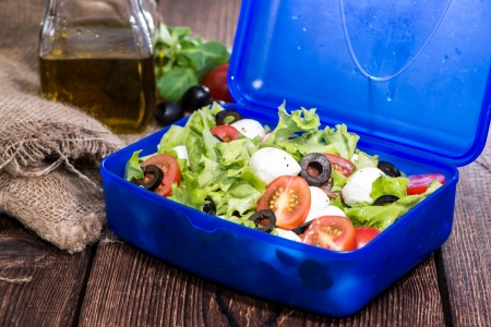 Healthy Lunchbox with fresh Tomato-Mozzarella Saladの写真素材