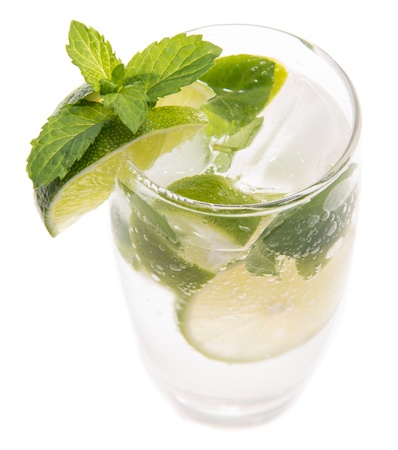 Sparkling Water with Limes and Mint isolated on whiteの写真素材