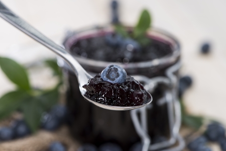 Portion of fresh made Blueberry Jam on a Spoonの写真素材