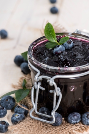 Glass with Blueberry Jam and fresh fruitsの写真素材