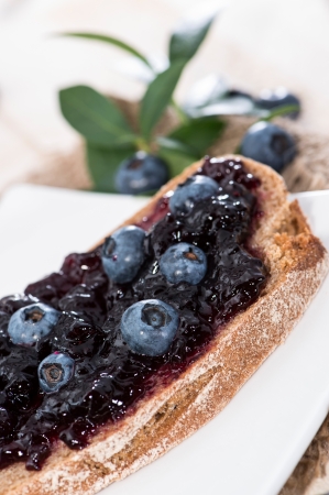 Slice of Bread with Blueberry Jam and fresh fruitsの写真素材