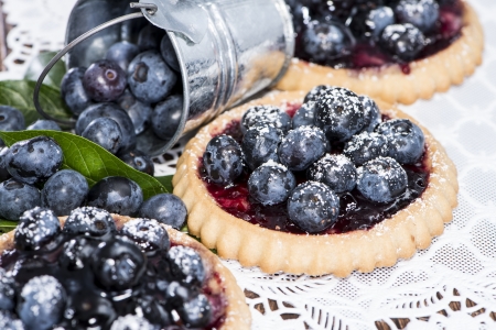 Homemade Blueberry Tart on vintage wooden backgroundの写真素材