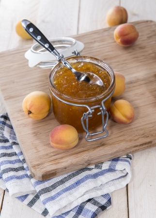 Homemade Apricot Jam on wooden backgroundの写真素材