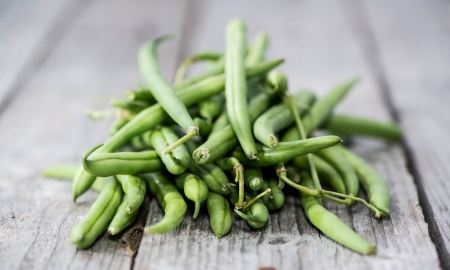 Green Beans on a grey vintage wooden background
