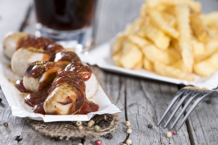 Fresh made German Currywurst (close-up shot)の写真素材