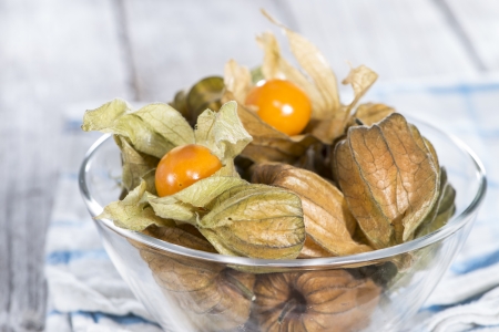 Physalis Fruits (macro shot) on vintage wooden backgroundの写真素材