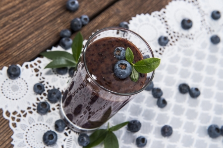 Fresh made Blueberry Smoothie on wooden backgroundの写真素材