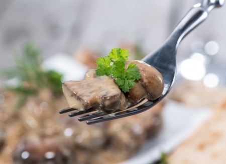 Mushrooms with Cream Sauce on a Fork の写真素材