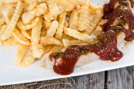 Fresh made German Currywurst (close-up shot)の写真素材