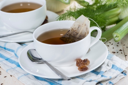 Fennel Tea  on a white wooden tableの写真素材
