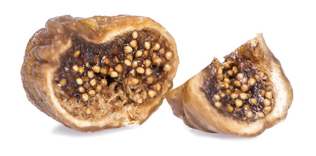Portion of fresh dried Figs isolated on white backgroundの写真素材