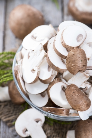 Heap of fresh sliced brown Mushroomsの写真素材