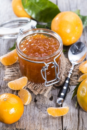 Fresh homemade Tangerine Jam on wooden backgroundの写真素材