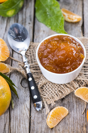 Fresh made Tangerine Jam on woodの写真素材