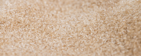 Detailed close-up shot of Brown Sugar as background imageの写真素材