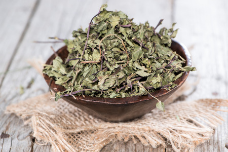 Portion of dried Mint (in a small bowl)の写真素材