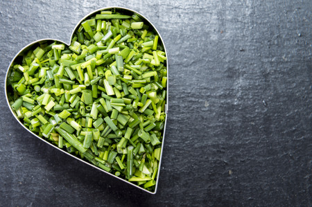 Heart shapes filled with fresh cutted Chive (I love herbs concept)