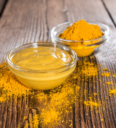 Homemade Curry Sauce in a small bowl in vintage backgroundの写真素材