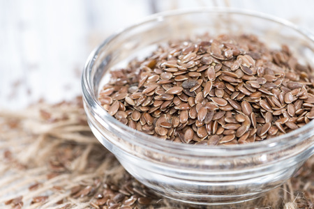 Portion of healthy brown Linseeds (detailed close-up shot)