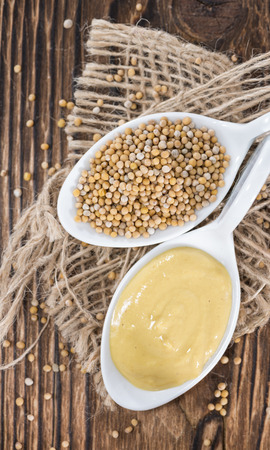 Small bowl with Mustard sauce (close-up shot)の写真素材