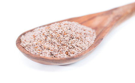 Psyllium seeds isolated on white background (close-up shot)
