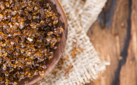 Heap of Smoked Salt on rustic wooden backgroundの写真素材