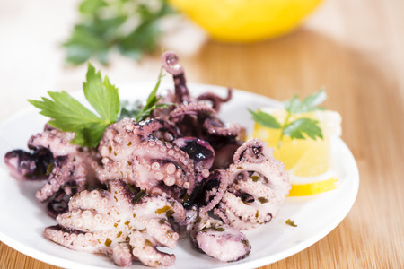 Fresh made Octopus Salad with oil, garlic, parsley and lemon