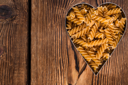 I Love Pasta concept (Wholemeal Fussili) with copyspaceの写真素材