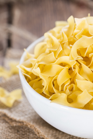 Portion of raw Tagliatelle (detailed close-up shot)の写真素材