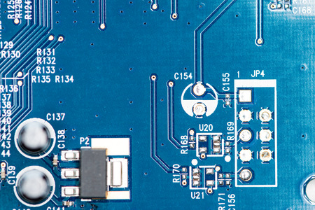 Chips on a blue PCB (detailed close-up shot)