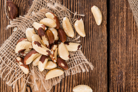 Portion of healthy Brazil Nuts as detailed close-up shot)の写真素材