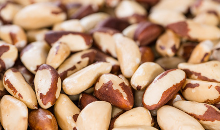 Brazil Nuts (detailed close-up shot) on an old vintage backgroundの写真素材