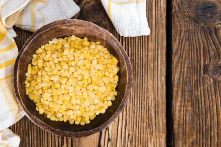 Portion of raw yellow Lentils (detailed close-up shot)の写真素材