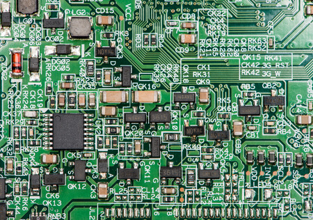 Circuit Board with a lot of different components (close-up shot)の写真素材