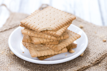 Portion of Butter Biscuits on wooden background