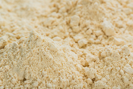 Portion of Soy Flour (detailed close-up shot) for use as backgroundの写真素材