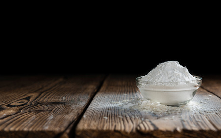 Rice Flour (close-up shot) on vintage wooden backgroundの写真素材