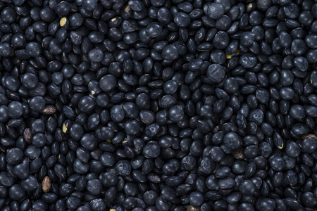 Black Lentils image for use as background or as textureの写真素材