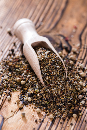 Wooden spoon with crushed Peppercorns (detailed close-up shot)の写真素材