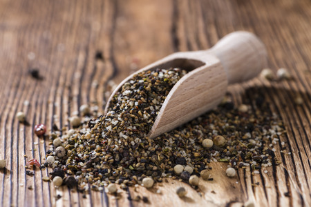 Crushed Peppercorns with different spices and salt (close-up shot)の写真素材