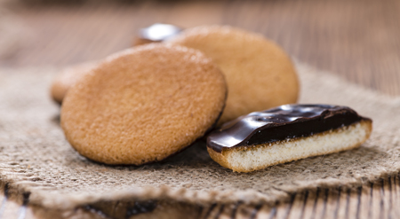 Some Jaffa Cakes (close-up shot) on rustic wooden backgroundの写真素材